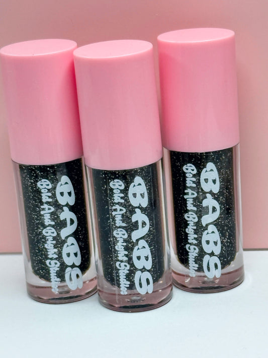 Gothamelon Breeze, Watermelon scented sparkly,black lip gloss ￼