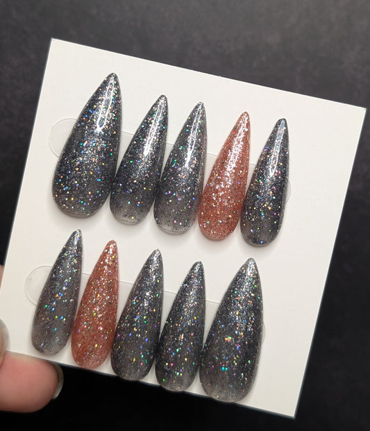 Stiletto shaped sparkly black/ sparkly rose gold budget friendly reusable press-on nails 10pc